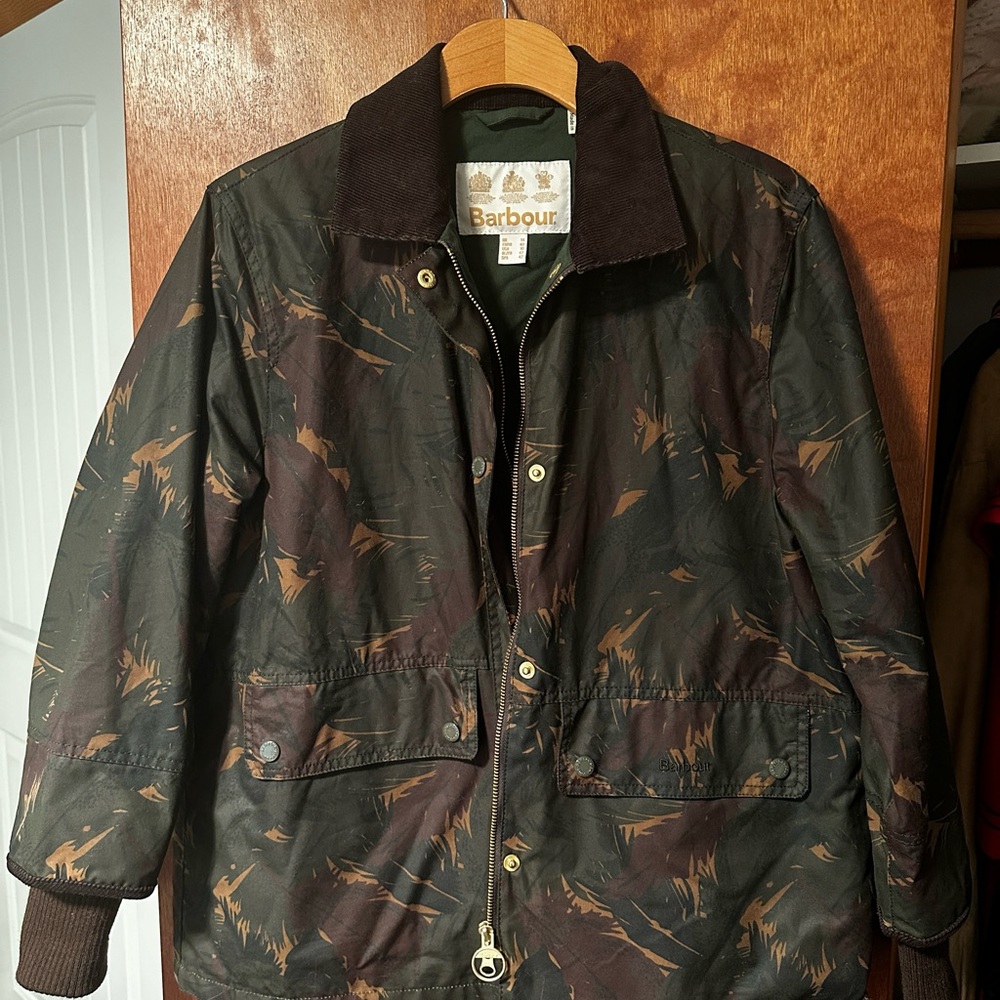NWOT Barbour jacket. Truly perfect condition; fits slim.